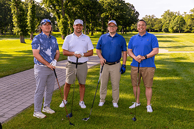 Hill Group foursome at ACH Golf Classic