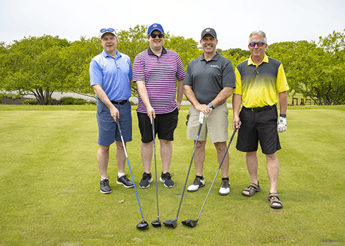 Foursome at ACH Golf Classic